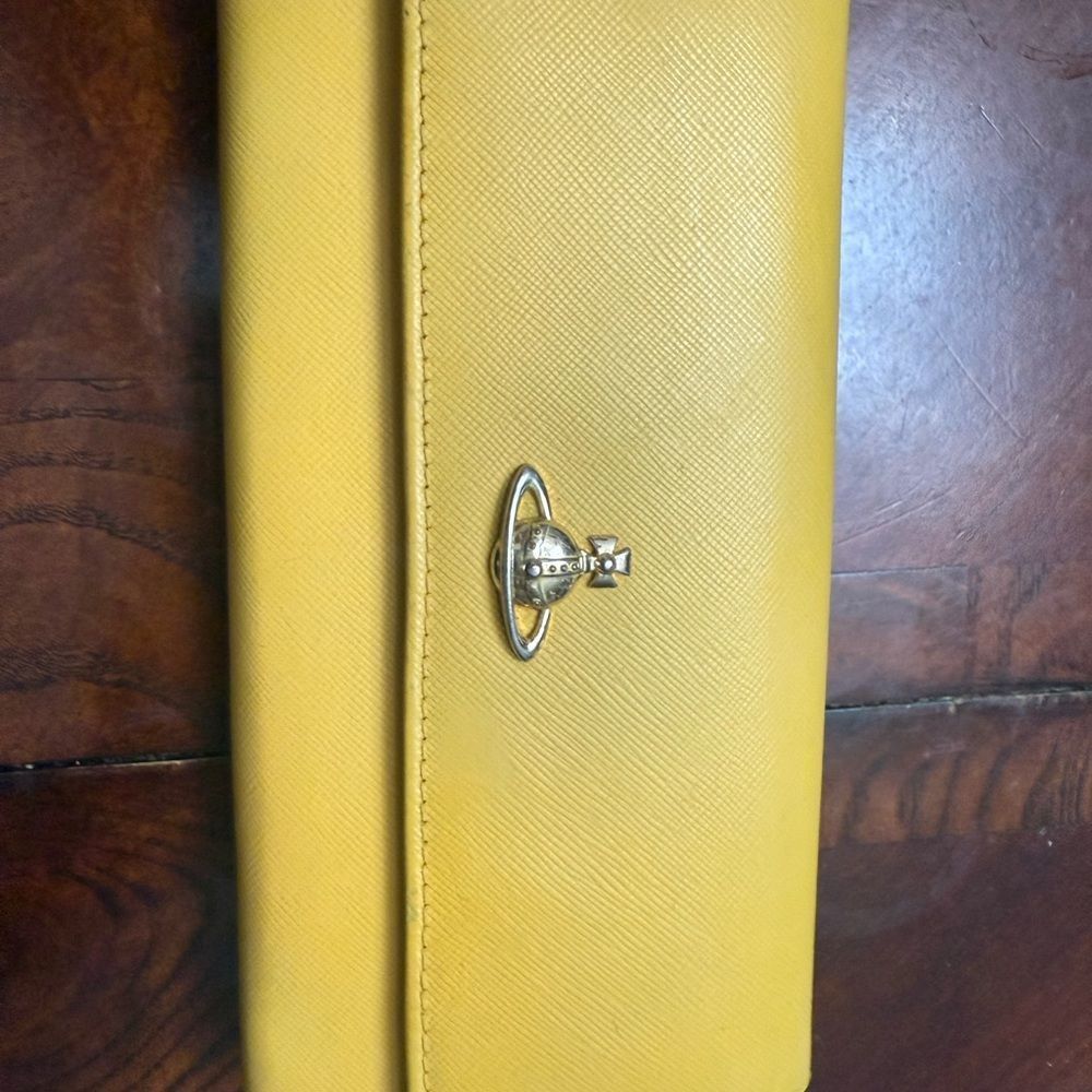 Used in great condition Vivienne Westwood Yellow long wallet